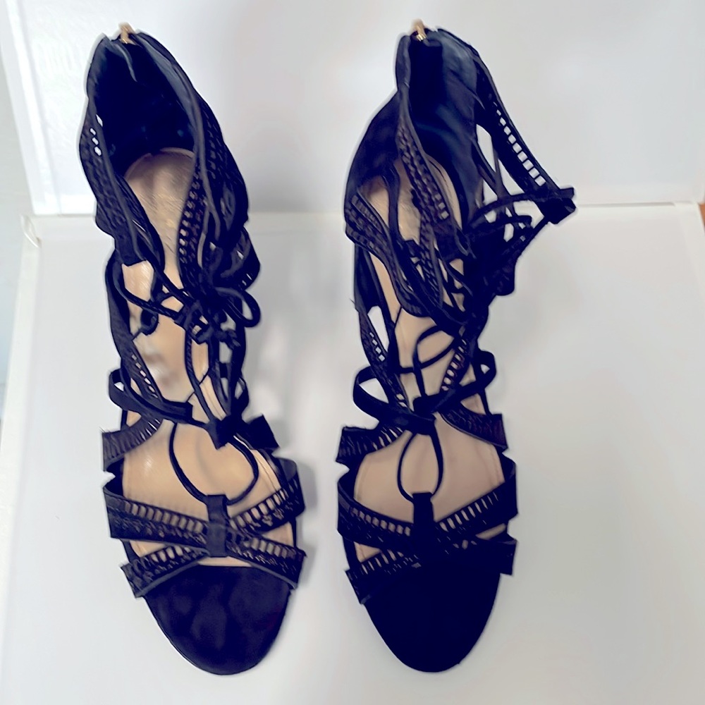 Vince Camuto 3in. Heel, lace up very sexy with the right outfit. Leather upper